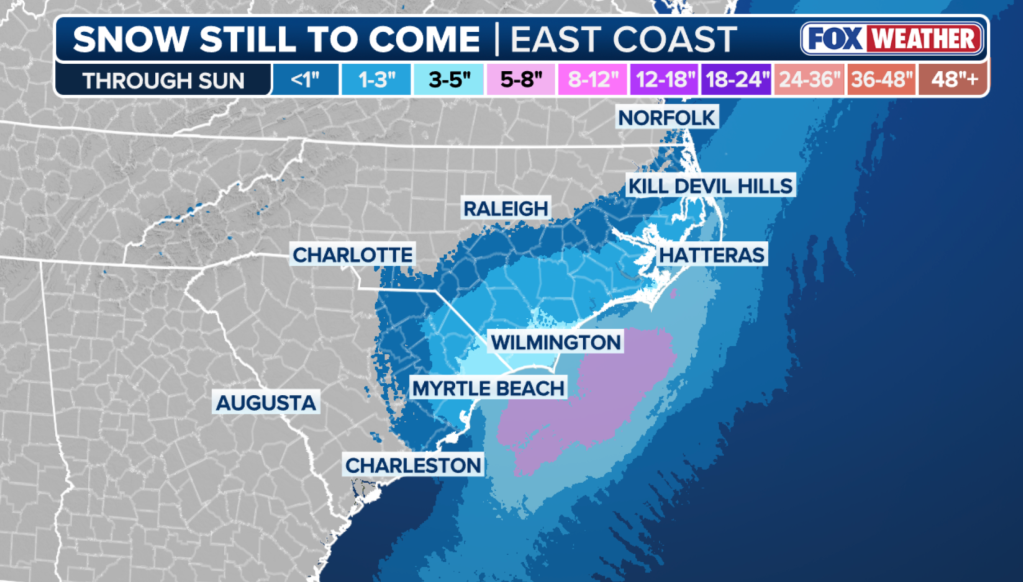 Map showing snow accumulation forecast for the East Coast from Virginia to Georgia, with heaviest snow expected offshore near Myrtle Beach and Wilmington.